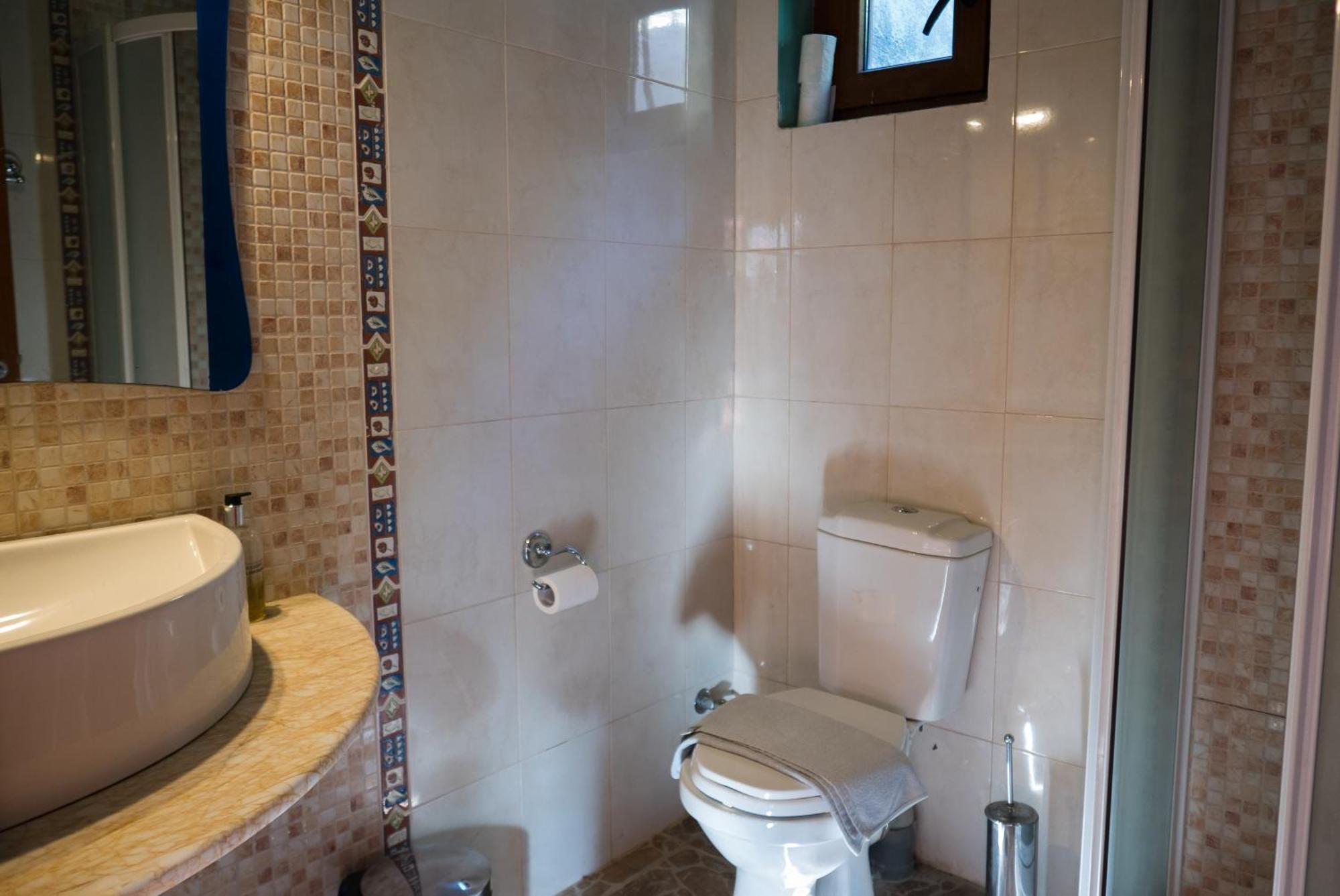 Akros Oreon Apartment Voliares Kato Simi Exterior photo